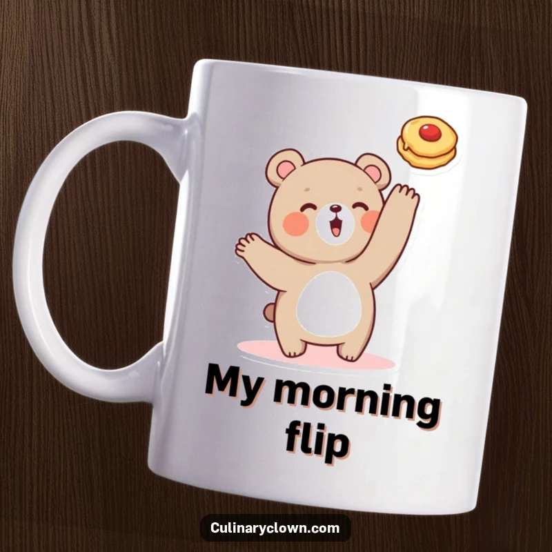Funny mug featuring a cute bear character joyfully flipping a pancake high into the air, celebrating breakfast chaos.