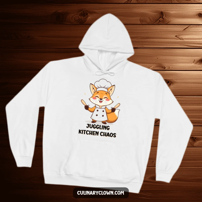 Funny fox chef juggling several rolling pins with a big smile, warm and cozy hoodie.