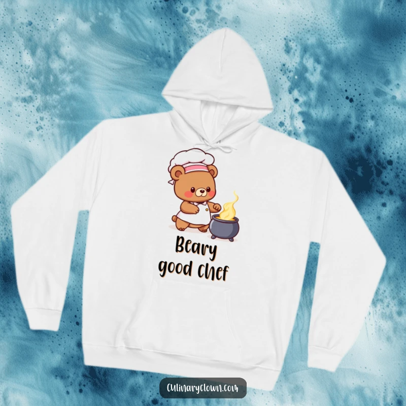 Cute bear chef character stirring a magic cauldron, featured on a soft hoodie, a great funny gift.