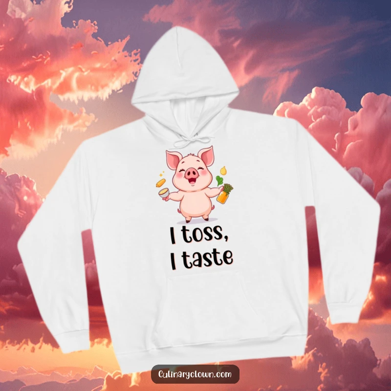 Funny hoodie with a cheerful pig juggling ingredients, symbolizing a fun and playful approach to cooking.