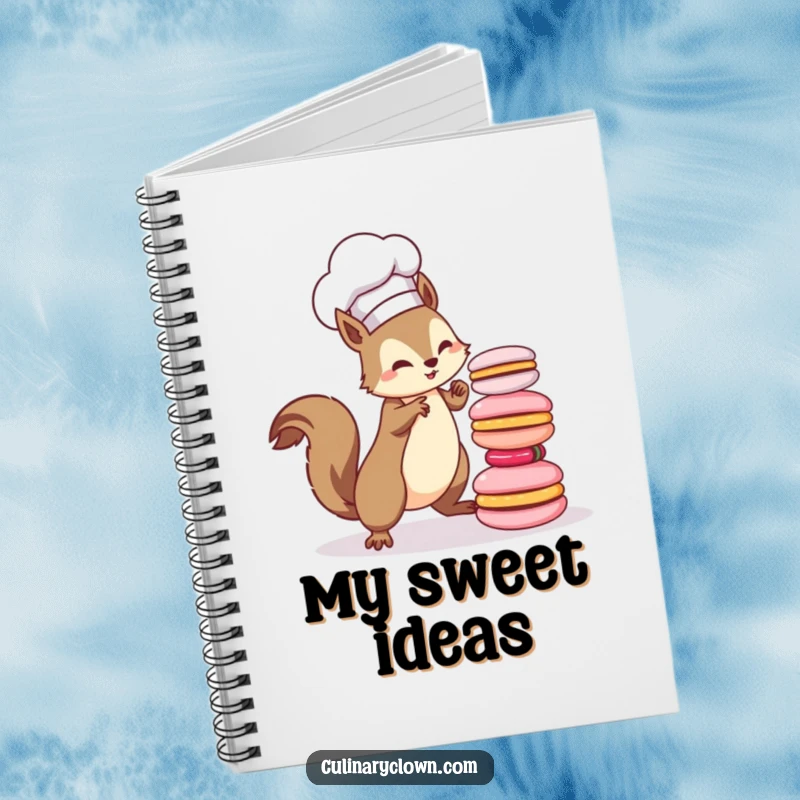 Funny kawaii squirrel chef balancing macarons on a notebook cover, ready for ideas, inspiring a funny gift choice.