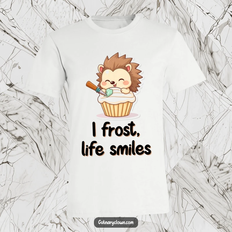 Funny t-shirt featuring a happy hedgehog skillfully frosting a cupcake with a confident and cheerful expression.