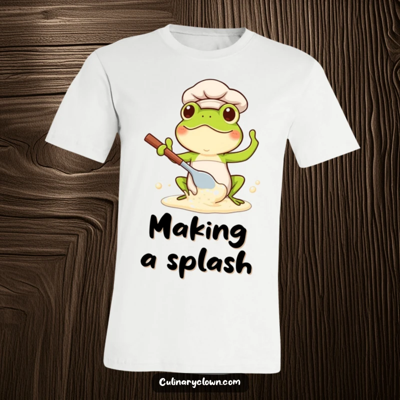 Funny Kawaii Frog Chef T-Shirt: Adorable frog chef happily splashing batter with a spoon, perfect for bakers.