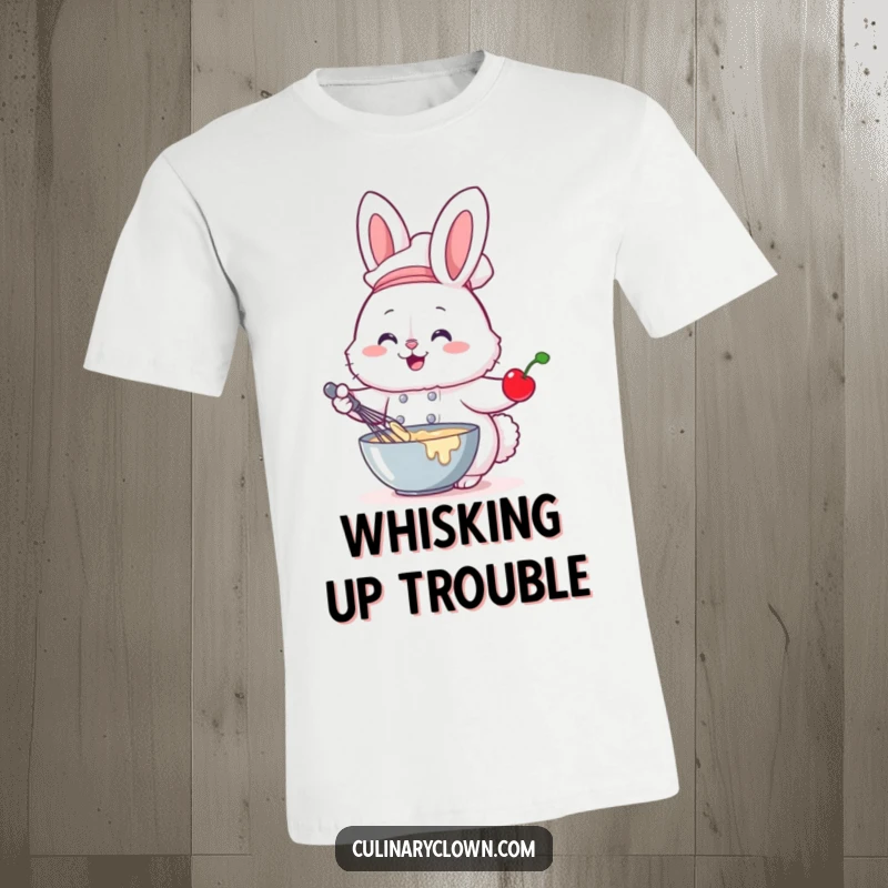 Funny t-shirt of a fluffy bunny chef energetically whisking batter while holding a cherry, perfect for baking enthusiasts.