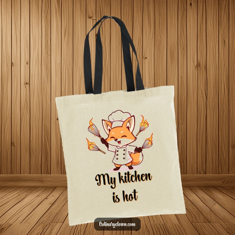 Funny tote bag featuring a determined fox chef juggling flaming whisks, symbolizing culinary adventure and bold kitchen skills.